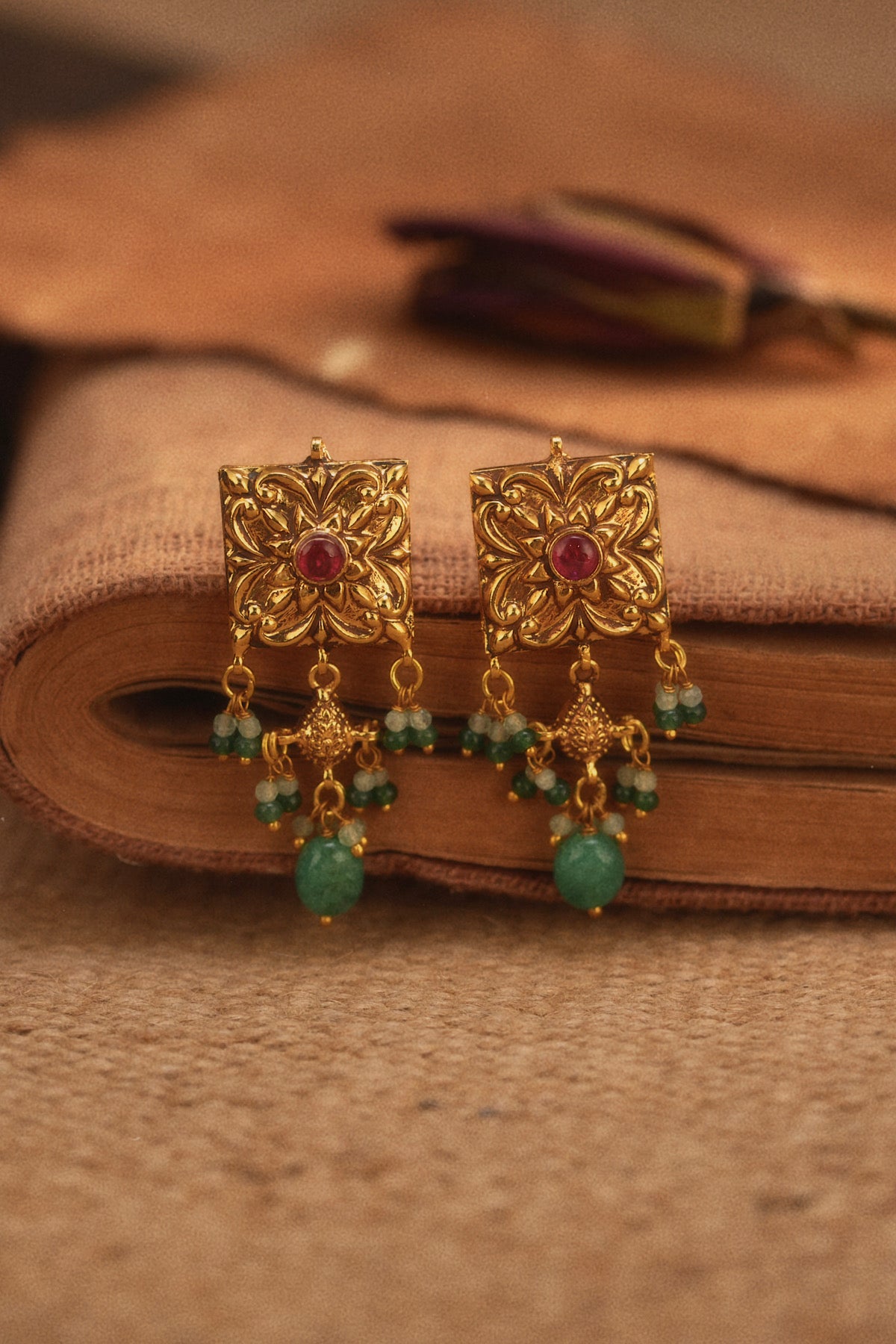 ruby green studs