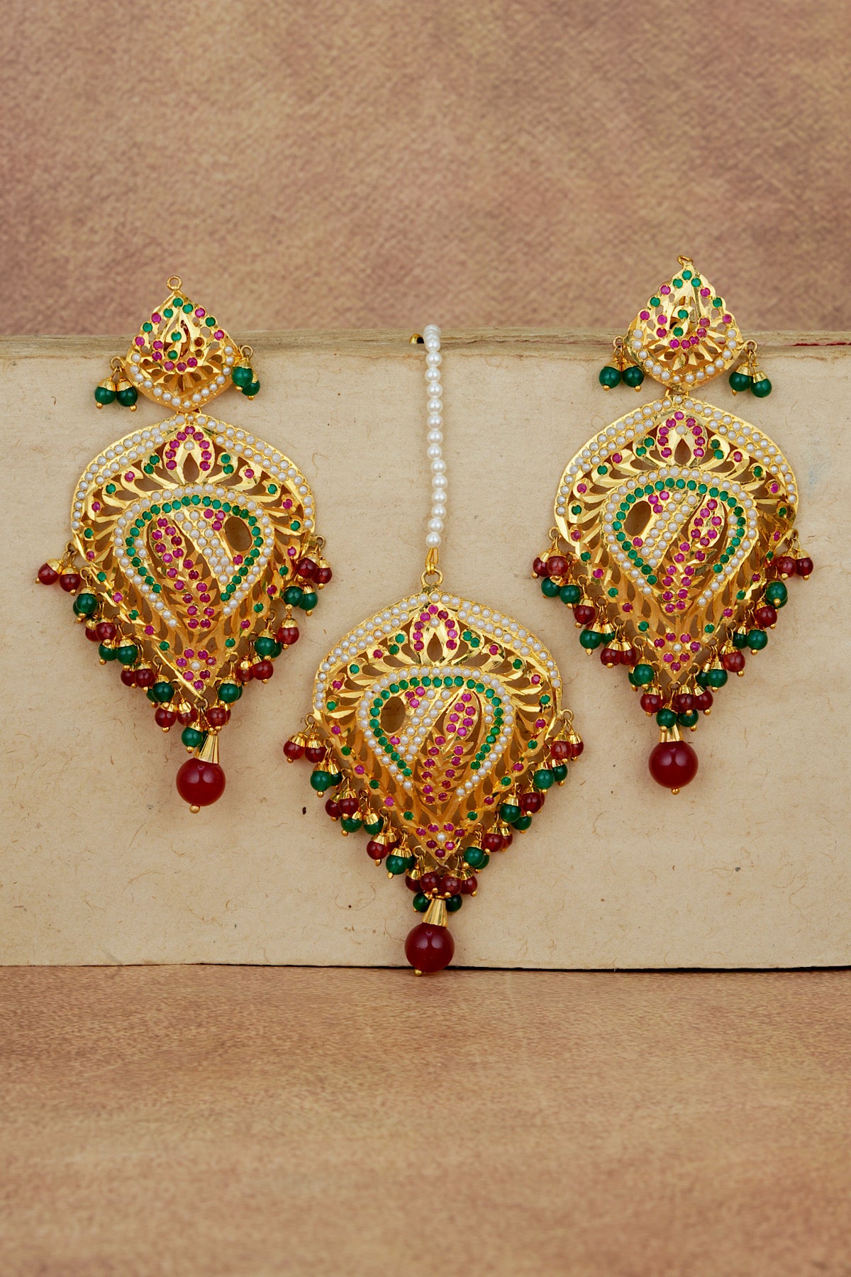 Sukhi Jadau Earrings Tikka Set